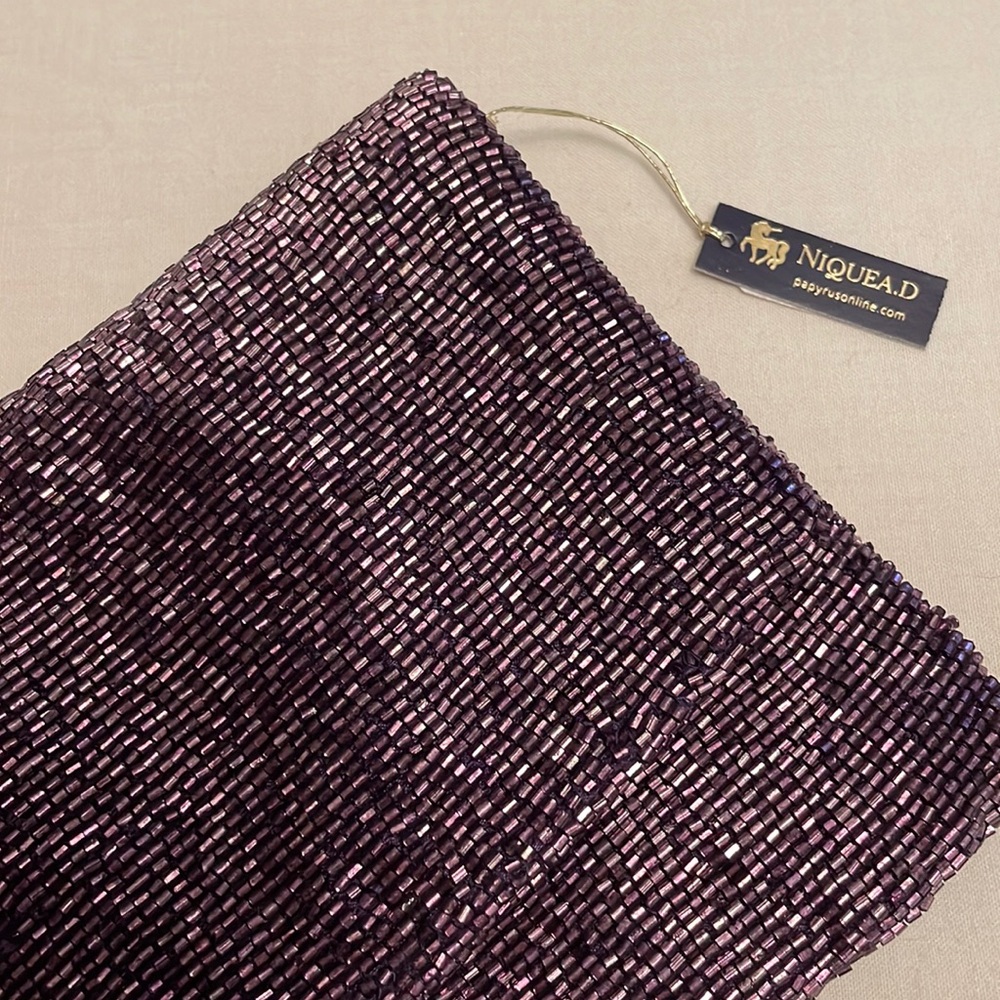 NWT NIQUEA.D Plum Beaded Clutch
